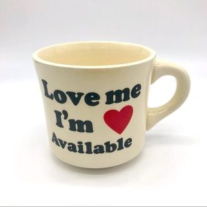Love Me I’m Available Coffee Mug